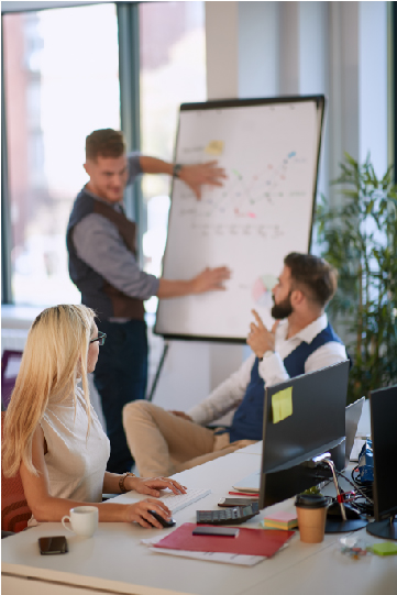 coworkers discussing needs assessment image